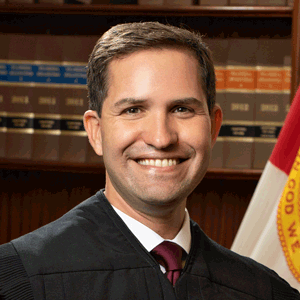 Justice John Couriel